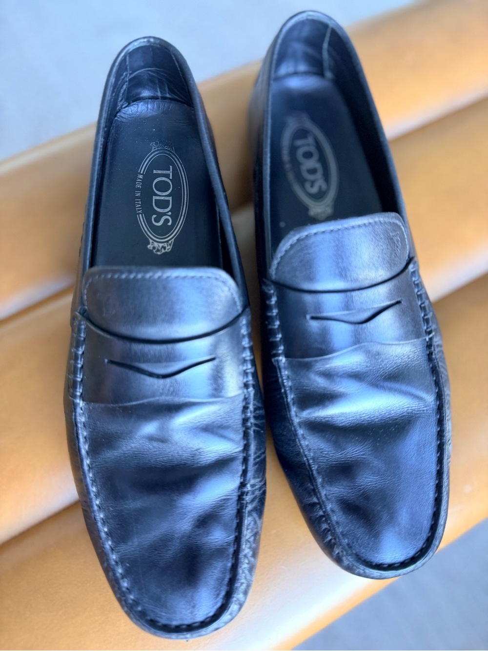 Tod's Black Leather Penny Loafers — Classic Slip-On Style